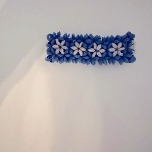 Blue and white stretch bracelet.